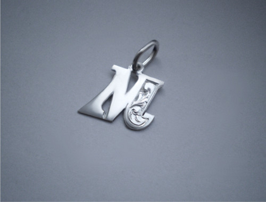 Ryté písmeno v kurzívě - přívěsek